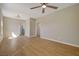 Bright living room featuring hardwood floors and modern ceiling fan at 524 Hopi Pl, Boulder City, NV 89005
