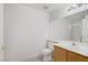 Bathroom with vanity, modern light fixture, large mirror, toilet, and shower at 525 Indian Princess Dr # 101, Las Vegas, NV 89145