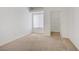 This bedroom features a walk-in closet and neutral carpet; offering comfort and convenience at 525 Indian Princess Dr # 101, Las Vegas, NV 89145