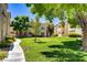Lush lawn and landscaping surrounding the building's exterior at 525 Indian Princess Dr # 101, Las Vegas, NV 89145