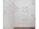 Walk-in closet with white wire shelving, carpeted floor, and white walls at 525 Indian Princess Dr # 101, Las Vegas, NV 89145
