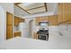 Clean kitchen featuring stainless steel appliances, tiled countertops, and ample cabinet space at 525 Indian Princess Dr # 101, Las Vegas, NV 89145