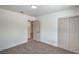 Bedroom featuring neutral carpet, white walls and trim, and a closet at 5279 Consul Ave, Las Vegas, NV 89142