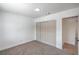 Bedroom with gray carpet, white walls, and a closet at 5279 Consul Ave, Las Vegas, NV 89142