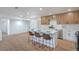 Stylish kitchen with a center island, modern cabinets, white countertops, and ample natural light at 5279 Consul Ave, Las Vegas, NV 89142