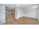 Open-concept layout with modern flooring connecting the living area to the stylish updated kitchen at 5279 Consul Ave, Las Vegas, NV 89142