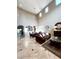 Spacious living room with soaring ceilings, marble floors, and abundant natural light at 530 Calahonda Ct, Las Vegas, NV 89138