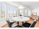 Bright breakfast nook featuring large windows and a stylish pendant light at 5704 Owl Butte Ct, Las Vegas, NV 89149