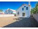 Rear exterior of home with stone backyard, ideal for outdoor activities and relaxation at 5984 Emerald Canyon Dr, Las Vegas, NV 89142