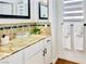 Bathroom featuring granite counters, glass bowl sink, modern fixtures and decorative towels at 5984 Emerald Canyon Dr, Las Vegas, NV 89142