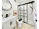 A modern bathroom featuring sleek fixtures, a glass-enclosed shower, and a stylish vanity at 5984 Emerald Canyon Dr, Las Vegas, NV 89142