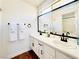 Bathroom with double sinks and vanity featuring plenty of counter space and storage at 5984 Emerald Canyon Dr, Las Vegas, NV 89142