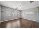 Sunny bedroom showcasing hardwood floors and natural light at 600 Federal St, Henderson, NV 89015