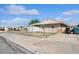 Street view of home with lawn, detached storage shed, and driveway at 600 Federal St, Henderson, NV 89015