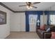 Bedroom with neutral carpet, couch with colorful accents, and plenty of natural light at 6804 Elm Creek Dr # 202, Las Vegas, NV 89108