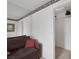 Bedroom with carpet, couch, and view of the walk-in closet at 6804 Elm Creek Dr # 202, Las Vegas, NV 89108