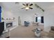 Spacious living room with high ceilings, fireplace, and dining area in view at 6804 Elm Creek Dr # 202, Las Vegas, NV 89108