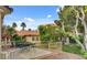 Private backyard offers a patio and a serene setting with mature trees at 7232 Vista Bonita Dr, Las Vegas, NV 89149