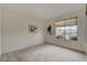 Empty bedroom with a window with neutral coverings and an outdoor view at 7232 Vista Bonita Dr, Las Vegas, NV 89149