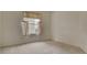 A bright carpeted bedroom featuring a window with neutral-toned coverings at 7232 Vista Bonita Dr, Las Vegas, NV 89149