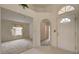 Welcoming entryway featuring arched accents and an open view into the living area at 7232 Vista Bonita Dr, Las Vegas, NV 89149