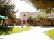 Exterior view of stucco home with tile roof and desert landscaping in Painted Desert community at 7232 Vista Bonita Dr, Las Vegas, NV 89149
