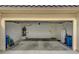 Spacious two-car garage with ample storage space and a water heater at 7232 Vista Bonita Dr, Las Vegas, NV 89149