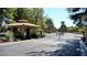 Community gate with desert landscaping and guard house at the entrance to Painted Desert community at 7232 Vista Bonita Dr, Las Vegas, NV 89149