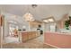 Spacious kitchen featuring an open floor plan, ample counter space, and eat-in dining at 7232 Vista Bonita Dr, Las Vegas, NV 89149