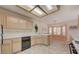 Bright kitchen boasting light wood cabinets, tiled floors, and a breakfast nook at 7232 Vista Bonita Dr, Las Vegas, NV 89149