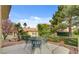 Outdoor patio with furniture provides a relaxing space with beautiful landscaping at 7232 Vista Bonita Dr, Las Vegas, NV 89149