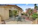 Cozy patio with a table and chairs perfect for outdoor dining at 7232 Vista Bonita Dr, Las Vegas, NV 89149