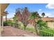 Backyard view showcasing lush greenery and mature landscaping for outdoor enjoyment at 7232 Vista Bonita Dr, Las Vegas, NV 89149