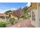 Picturesque backyard with a charming walking path and well-maintained landscaping at 7232 Vista Bonita Dr, Las Vegas, NV 89149
