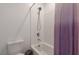 Bathroom with shower-tub combination, toilet, and lavender curtain at 754 Tallgrass St, Las Vegas, NV 89138