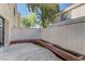 Fenced backyard with patio and greenery at 7968 Lisa Dawn Ave, Las Vegas, NV 89147