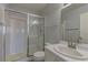 Well-lit bathroom with a glass-enclosed shower, modern fixtures, and a clean, inviting design at 7968 Lisa Dawn Ave, Las Vegas, NV 89147