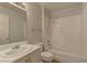 Well-lit bathroom featuring a shower-tub combination and a single sink at 7968 Lisa Dawn Ave, Las Vegas, NV 89147