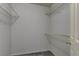 Functional walk-in closet with shelving for organized storage, offering ample space for clothing at 7968 Lisa Dawn Ave, Las Vegas, NV 89147