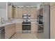 Well-equipped kitchen featuring stainless steel appliances and ample cabinet space, designed for convenience and style at 8116 Kokoma Dr, Las Vegas, NV 89128