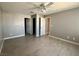 Spacious bedroom with wood floors, ceiling fan and multiple closets at 8600 W Charleston Blvd # 2033, Las Vegas, NV 89117