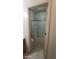 Bathroom features a shower-over-tub combination with sliding glass doors at 864 Chianti Way, Mesquite, NV 89027