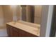 Bathroom featuring a double sink vanity with a large mirror and shower/tub in the background at 864 Chianti Way, Mesquite, NV 89027