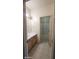 Neutral toned bathroom features a shower over bath and a good sized vanity unit at 864 Chianti Way, Mesquite, NV 89027