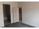 Bedroom with new carpet, and view into the Primary bathroom at 864 Chianti Way, Mesquite, NV 89027