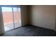 Cozy bedroom featuring a sliding glass door and outdoor access at 864 Chianti Way, Mesquite, NV 89027