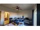 View of bedroom featuring a ceiling fan, with a view to the en suite bathroom at 864 Chianti Way, Mesquite, NV 89027
