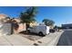 Charming single-story home showcasing a well-maintained exterior with a private one-car garage and desert landscaping at 864 Chianti Way, Mesquite, NV 89027