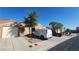 Charming single-story home showcasing a well-maintained exterior with a private one-car garage and desert landscaping at 864 Chianti Way, Mesquite, NV 89027