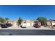 Charming single-story home showcasing a well-maintained exterior with a private two-car garage and desert landscaping at 864 Chianti Way, Mesquite, NV 89027